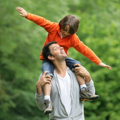 Father and son playing outside